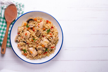 Rice paella with turkey and vegetables. Healthy recipe.