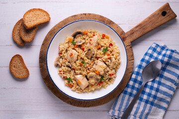 Rice paella with turkey and vegetables. Healthy recipe.