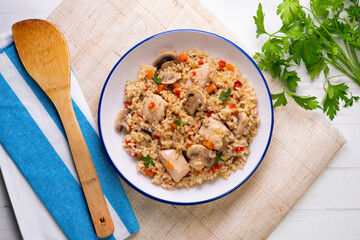 Rice paella with turkey and vegetables. Healthy recipe.