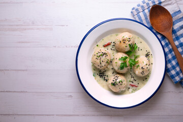 Fish meatballs with white wine sauce. Traditional tapas from Barcelona, ​​Spain.