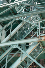 Blue painted ladder at the factory, close up with details