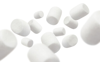 Flying marshmallows, isolated on white background