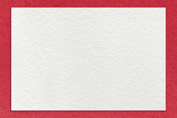 Texture of craft white color paper background with red border, macro. Structure of vintage dense...