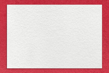 Texture of craft white color paper background with red border, macro. Structure of vintage dense...