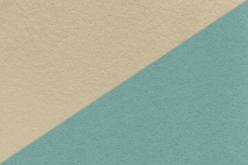 Texture of craft beige and blue paper background, half two colors. Vintage kraft cerulean and brown cardboard