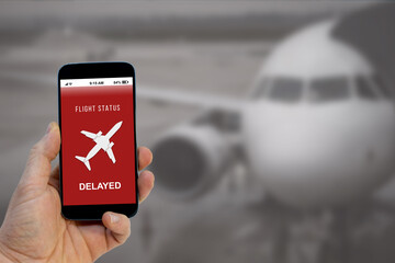 Flight statut notification on smartphone - Flight delayed - obrazy, fototapety, plakaty