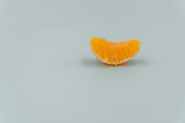 slices of clementines tangerines mandarins on white background detail