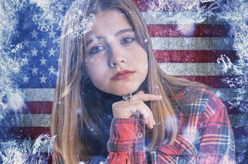 Teenage girl on frozen background with flag of United States of America. Concept of crisis in USA...