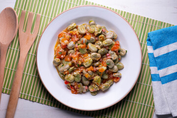 Beans with ham. Typical Spanish tapas recipe.