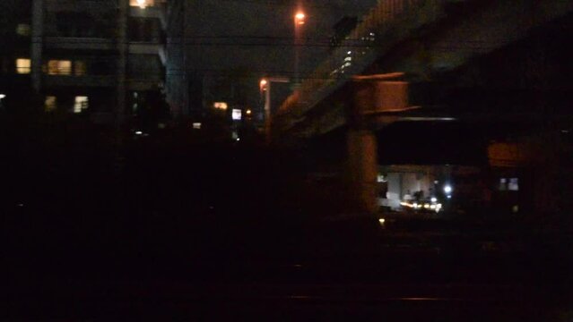 Train window of night Tokyo