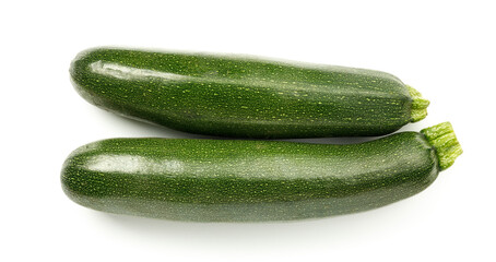 Green zucchini on a white background, ripe vegetables.
