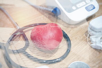 Red heart to represent the valentine day greeting card. The face mask, stethoscope, red heart on a white background on the table. for health care and medical management.