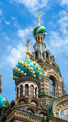 Multicolored domes of Cathedral or Church of Savior on Spilled Blood, St. Petersburg, Russia. Vertical image