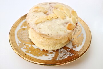 Japanese Souffle Pancake. A plate of fluffy pancake with Tiramisu Almond topping isolated on white background