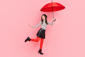 Photo of carefree stylish trendy lady catch fly air parasol enjoy sale discount copyspace isolated pastel color background