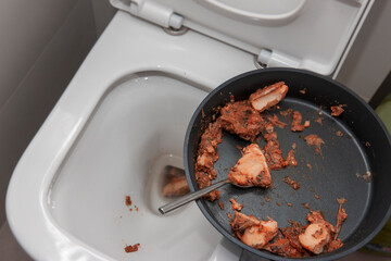 throwing away a stinky dish