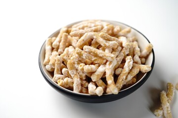 Sweet sev seerni  seeni or madhura seva - deep fried Diwali snack with chickpea flour, selective focus