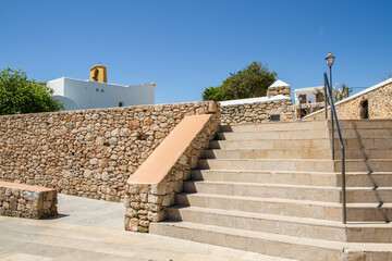 Pitoresque village Santa Gertrudis with stairs and brick wall, famous place for a daytrip at Ibiza island, Balearic islands, Spain, Europe