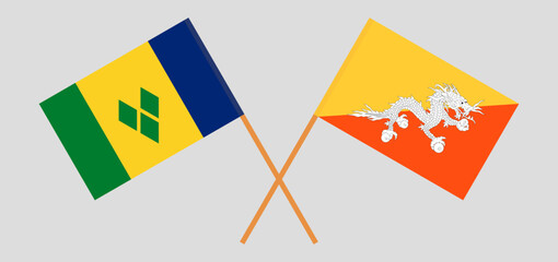 Crossed flags of Saint Vincent and the Grenadines and Bhutan. Official colors. Correct proportion