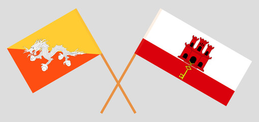 Crossed flags of Bhutan and Gibraltar. Official colors. Correct proportion