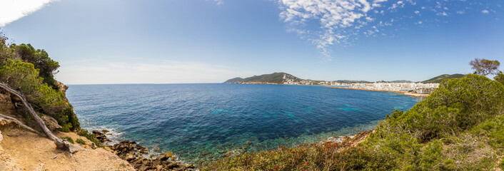 Beautiful seascape of the Mediterranean Sea and rocky coast of Ibiza island near Santa Eulalia del Rio, Spain (Panorama)