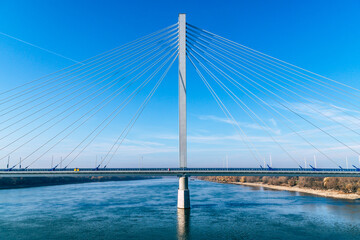 Obraz premium The new bridge Monostor between Slovakia and Hungary connecting the cities of Komarno and Komarom