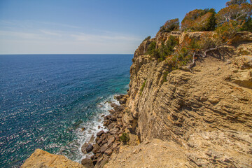 Beautiful seascape of the Mediterranean Sea and rocky coast of Ibiza island near Santa Eulalia del Rio, Spain