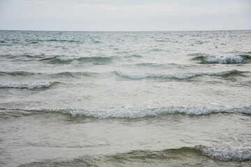 sand on the beach is natural for the background