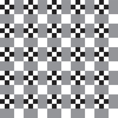 Black and white square dots on black and white checker pattern background.