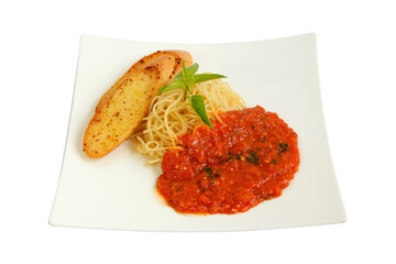Spaghetti on white plate with rich tomato and meat sauce with salad and garlic bread.