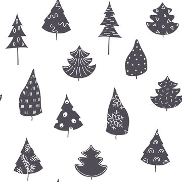 Seamless  holiday background. Silhouette Christmas trees with white different patterns.