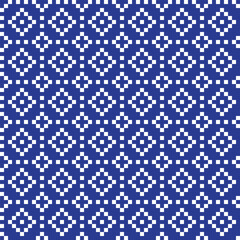 White cross-stitch knitting pattern on blue background. White square dots on backdrop. Fabric pattern design for sale. Knitting handicraft art.