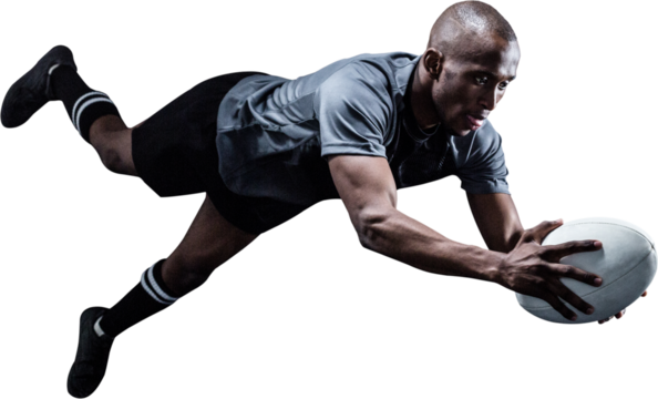 Image of male african american rugby player in air holding ball - Powered by Adobe