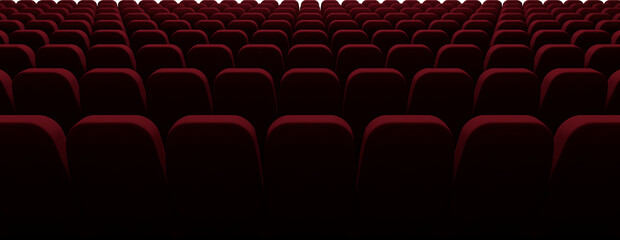 Image of rows of empty red theatre or cinema seats