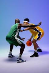 Fototapeta na wymiar Image of two diverse basketball players with basketball playing on purple to blue background