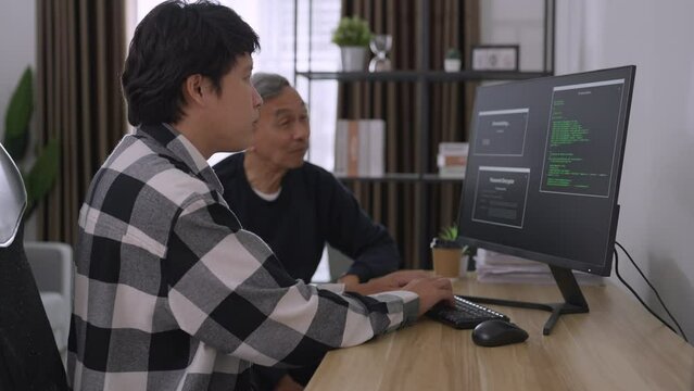 Asian man coding and programming on screen desktop. development web, hacker, developer concept.