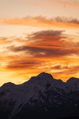 Sunset on the peaks of the Andes Mountains, Views from the San Carlos de Bariloche Circuit, Nahuel Huapi National Park. Patagonia, Argentina.