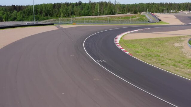 MotoGP track, moto racers. Aerial view. Sunny day