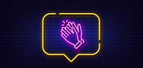 Neon light speech bubble. Clapping hands line icon. Clap sign. Victory gesture symbol. Neon light background. Clapping hands glow line. Brick wall banner. Vector
