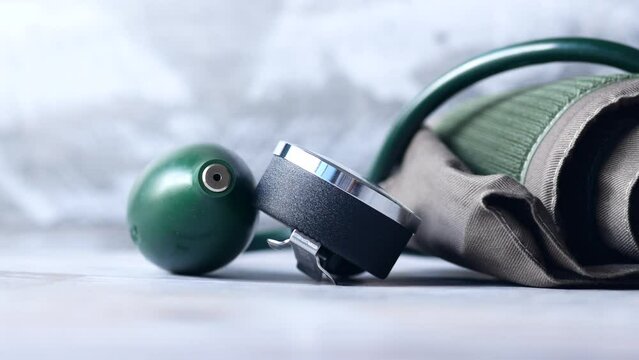 detail shot of blood pressure machine on table 