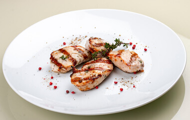 Grilled chicken breast on white background
