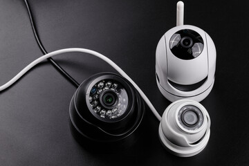 Surveillance cameras, set of different videcam, cctv cameras isolated on black background close up. home security system concept