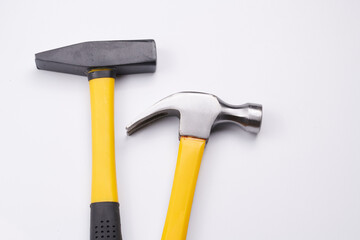 Different construction hammers isolated on white background close-up