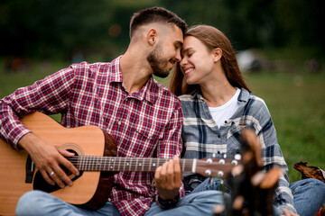 Fototapeta premium Close-up of couple in love on romantic date at the park