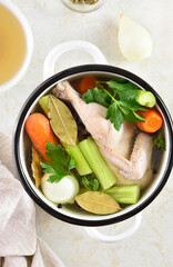 Chicken broth with vegetables and spices