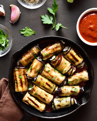 Eggplant (aubergine) rolls with cheese and greens