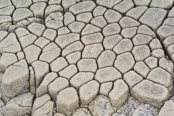 natural stone background, the remains of lava basalt columns form a kind of cobblestone causeway