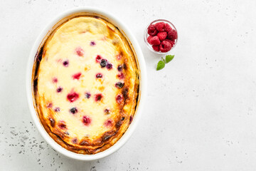 Healthy cottage cheese berry casserole, cheese cake. Top view, copy space, top view.