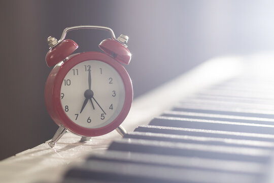 alarm clock on piano, synthesizer