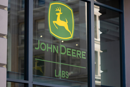 San Francisco, CA, USA - May 1, 2022: John Deere logo is seen at the John Deere Labs in San Francisco, California. The lab is focused on technologies including artificial intelligence and automation.